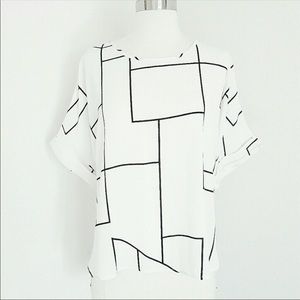 Abstract black and white blouse with tails